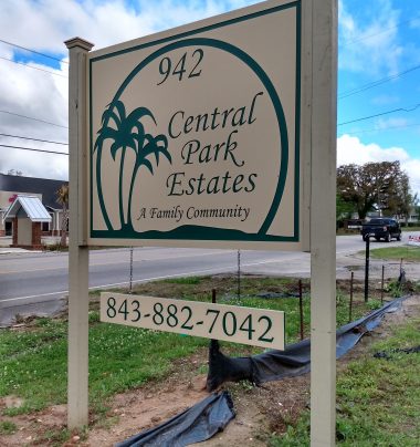 Entrance sign for Central Park Estates with phone number 843-882-7042